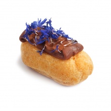 Mini eclairs with vanilla cream and chocolate glaze