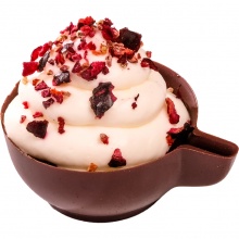 Chocolate cup with lime cream and cherry filling